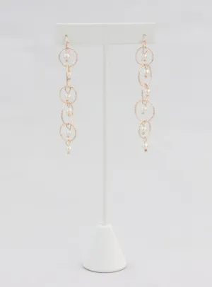 Rose gold linked hoop and pearl earrings