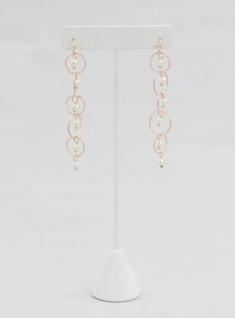 Rose gold linked hoop and pearl earrings